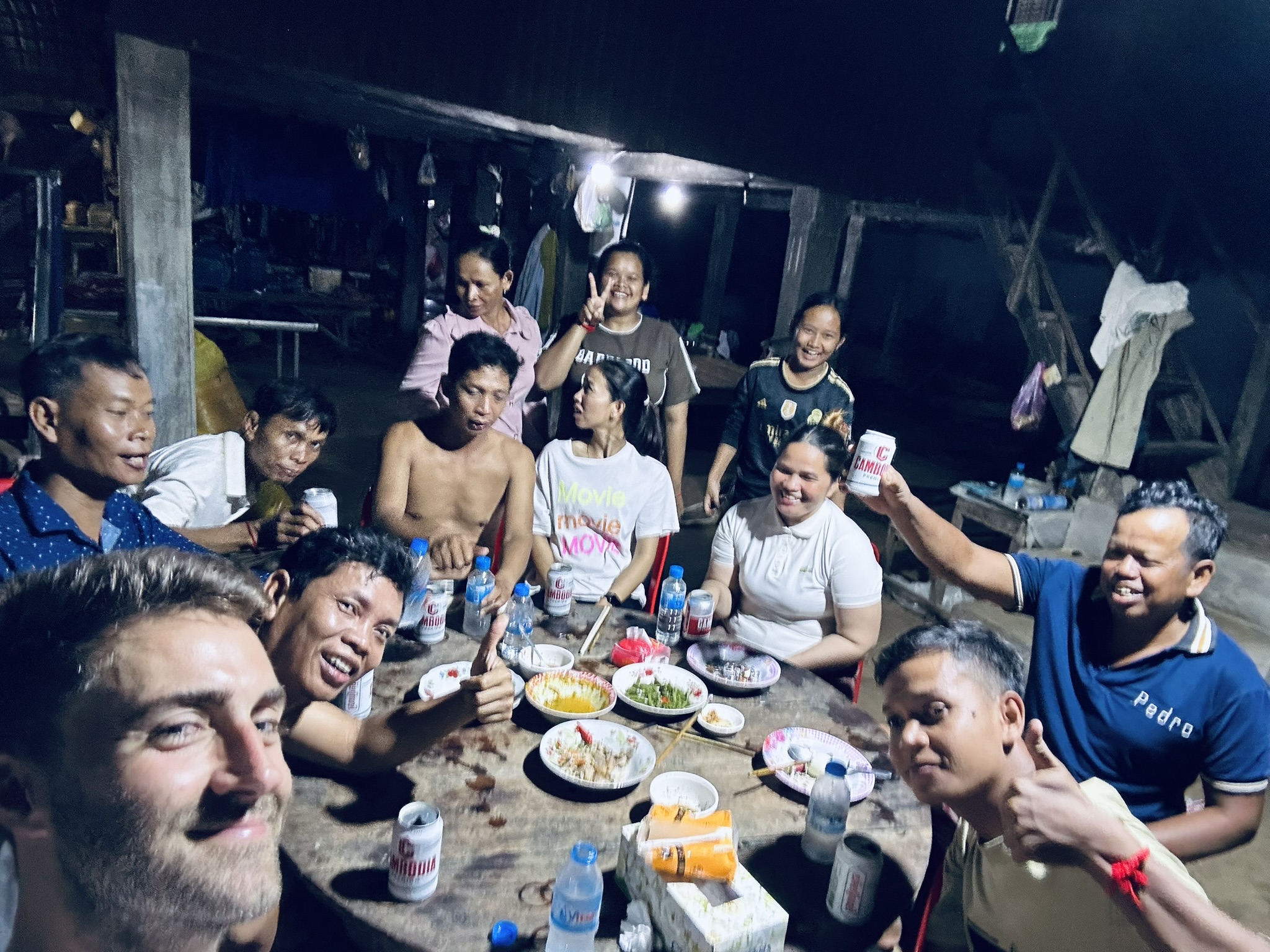 family-dinner-home-village Enjoying a traditional home-cooked Khmer dinner with Bunna’s extended family in Kampong Trabaek village.
