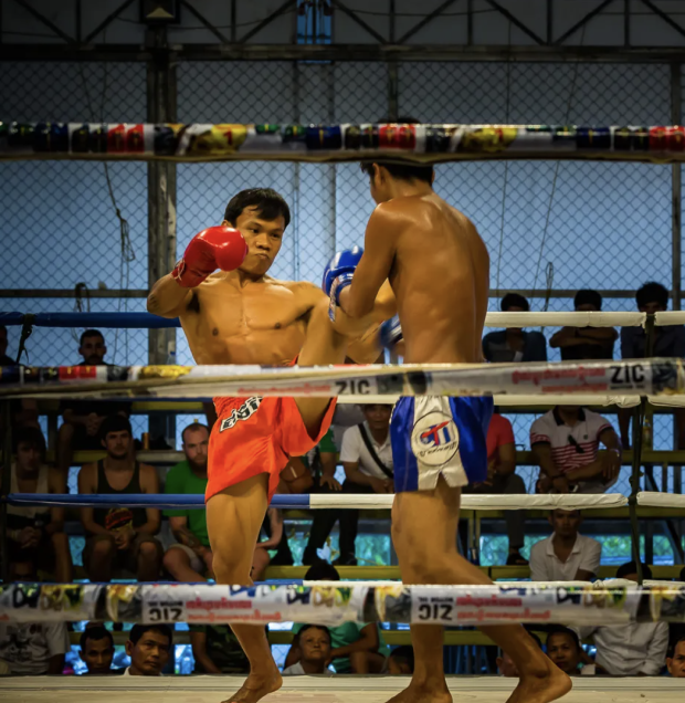 Authentic Kun Khmer boxing match during a weekly fight night in Phnom Penh, Cambodia